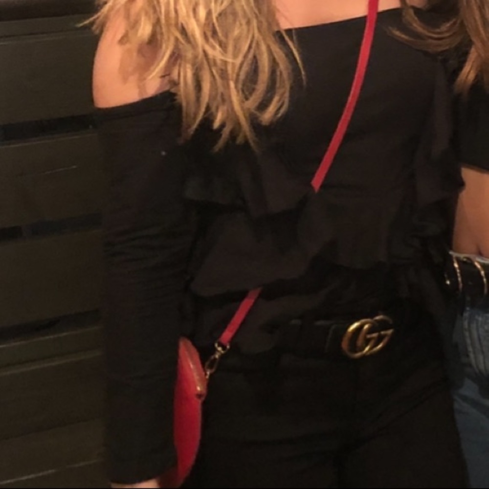 Black off the shoulder crop top with ruffles